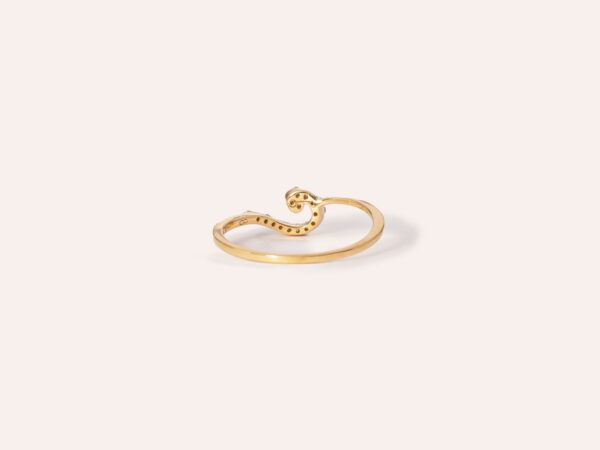 J-shaped ring crafted in 18k gold, featuring sleek curves and a minimalist design, perfect for modern elegance and everyday wear.